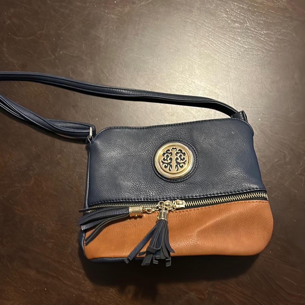 Navy and tan crossbody bag